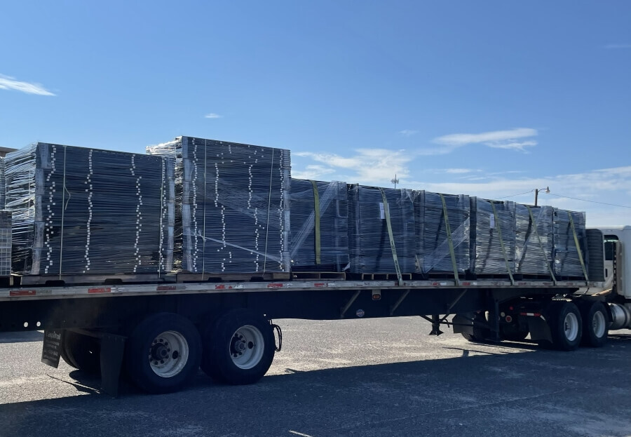 truckload of fence supplies